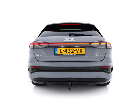 Audi Q4 e-tron 40 Launch edition S Competition 77 kWh [ 3-Fase ] {SOH-90%} (INCL.BTW) *HEAT-PUMP | PANO | HEAD-UP | LEATHER-FABRIC | MATRIX-LED | SONOS-SOUND | ADAPTIVE-CRUISE | HEATED-SPORTSEATS | AMBIENT-LIGHT | DIGI-COCKPIT | CAMERA | KEYLESS | DAB+ | NAVI-FULLMA