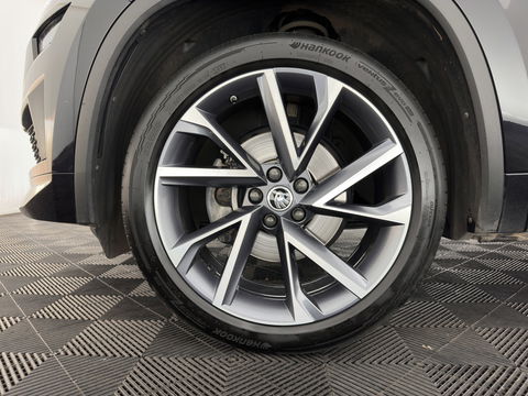 Škoda Kodiaq 1.5 TSI Sportline Business [ 7-Pers. ] (INCL-BTW) Aut. *LEATHER-MICROFIBRE | FULL-LED | ADAPTIVE-CRUISE | MEMORY-PACK | DIGI-COCKPIT | NAVI-FULLMAP | CAMERA | DAB+ | AMBIENT-LIGHT | KEYLESS | CARPLAY | PRIVACY-GLASS| TOWBAR | 20''