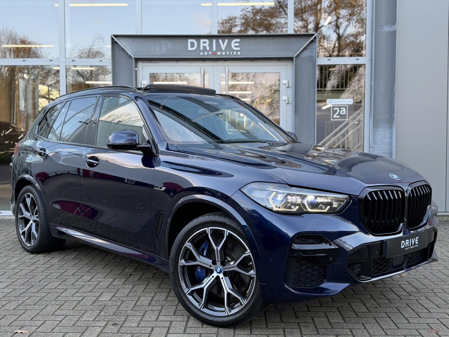 BMW X5 xDrive45e High Ex. M-Sport|Individual|SOH93%|Pano|Laser|CoPilot|21"|HUD|HIFI|Trekhaak|Tansanit
