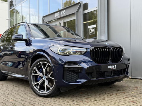 BMW X5 xDrive45e High Ex. M-Sport|Individual|SOH93%|Pano|Laser|CoPilot|21"|HUD|HIFI|Trekhaak|Tansanit