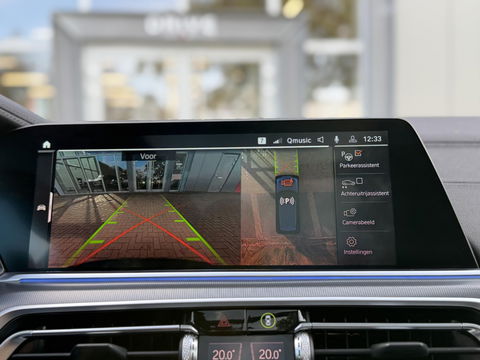 BMW X5 xDrive45e High Ex. M-Sport|Individual|SOH93%|Pano|Laser|CoPilot|21"|HUD|HIFI|Trekhaak|Tansanit