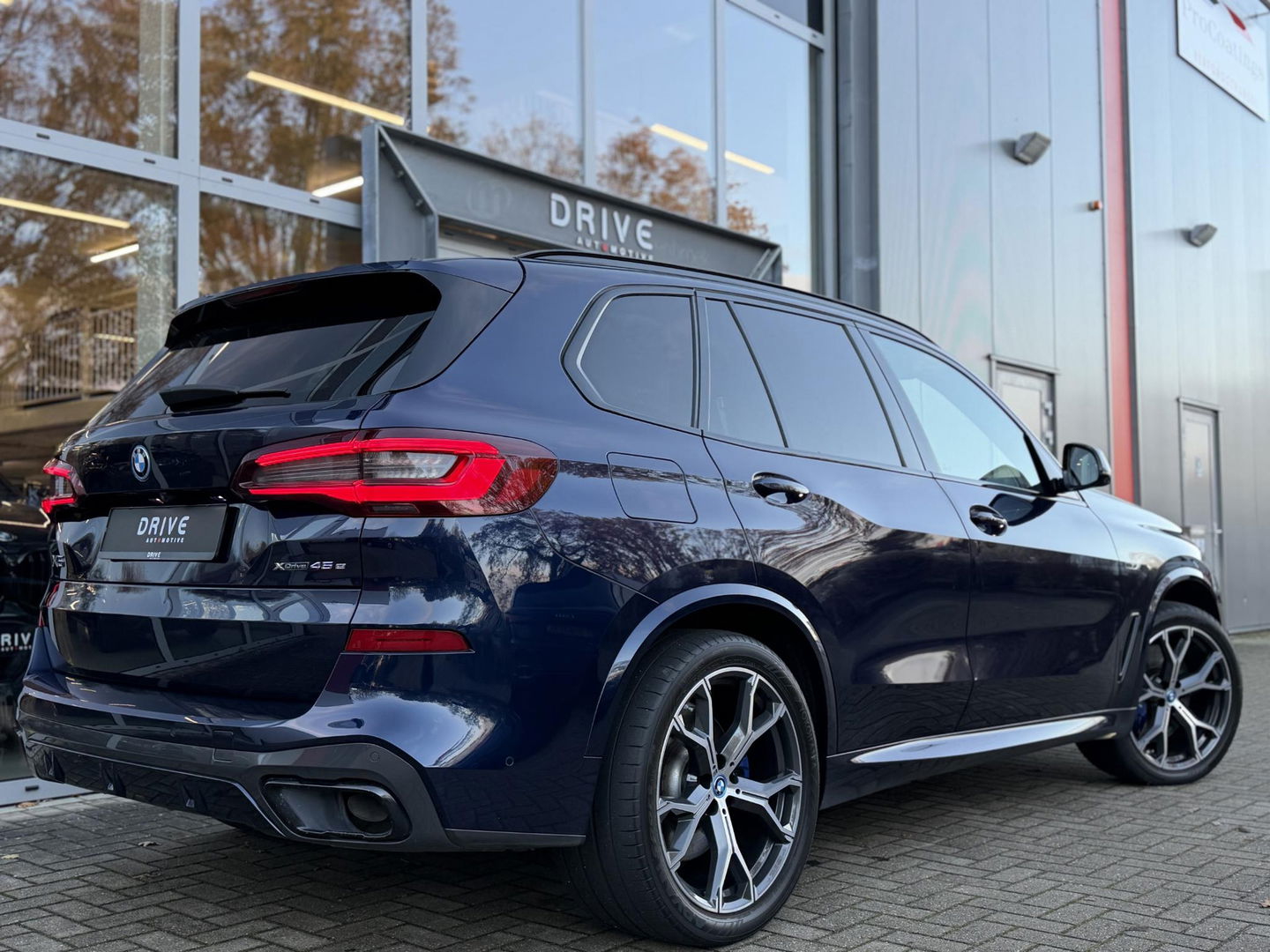 BMW X5 xDrive45e High Ex. M-Sport|Individual|SOH93%|Pano|Laser|CoPilot|21"|HUD|HIFI|Trekhaak|Tansanit
