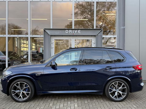 BMW X5 xDrive45e High Ex. M-Sport|Individual|SOH93%|Pano|Laser|CoPilot|21"|HUD|HIFI|Trekhaak|Tansanit