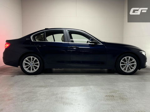 BMW 3 Serie 330e M-Sport Leer Navi Cruise PDC NAP