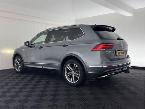 Volkswagen Tiguan Allspace 1.5 TSI R-line Highline Business (7-Pers.) (INCL-BTW) Aut * PANO | NAVI-FULLMAP | XENON | ALCANTARA | HEATED-ERGONOMIC-SPORTSEATS | KEYLESS | PRIVACY-GLASS | CAMERA | DAB | DIGI-COCKPIT | PDC | TOWBAR | ECC | 19"ALU*