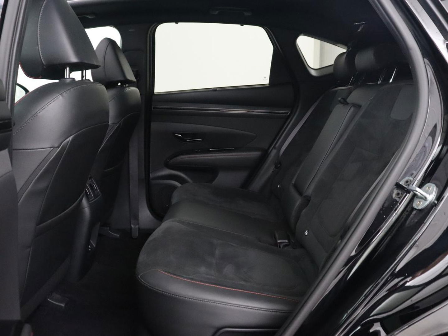 Hyundai Tucson 1.6 T-GDI PHEV N Line Sky 4WD | Panoramadak | Stoelverwarming | Leder/Alcantara | Camera | Adaptive cruise | Carplay | Full LED | Stuurverwarming | Keyless | Plug In