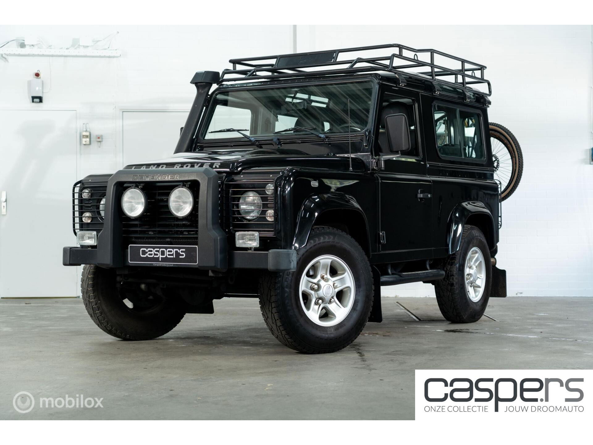 Land Rover Defender 90 SW geel kenteken
