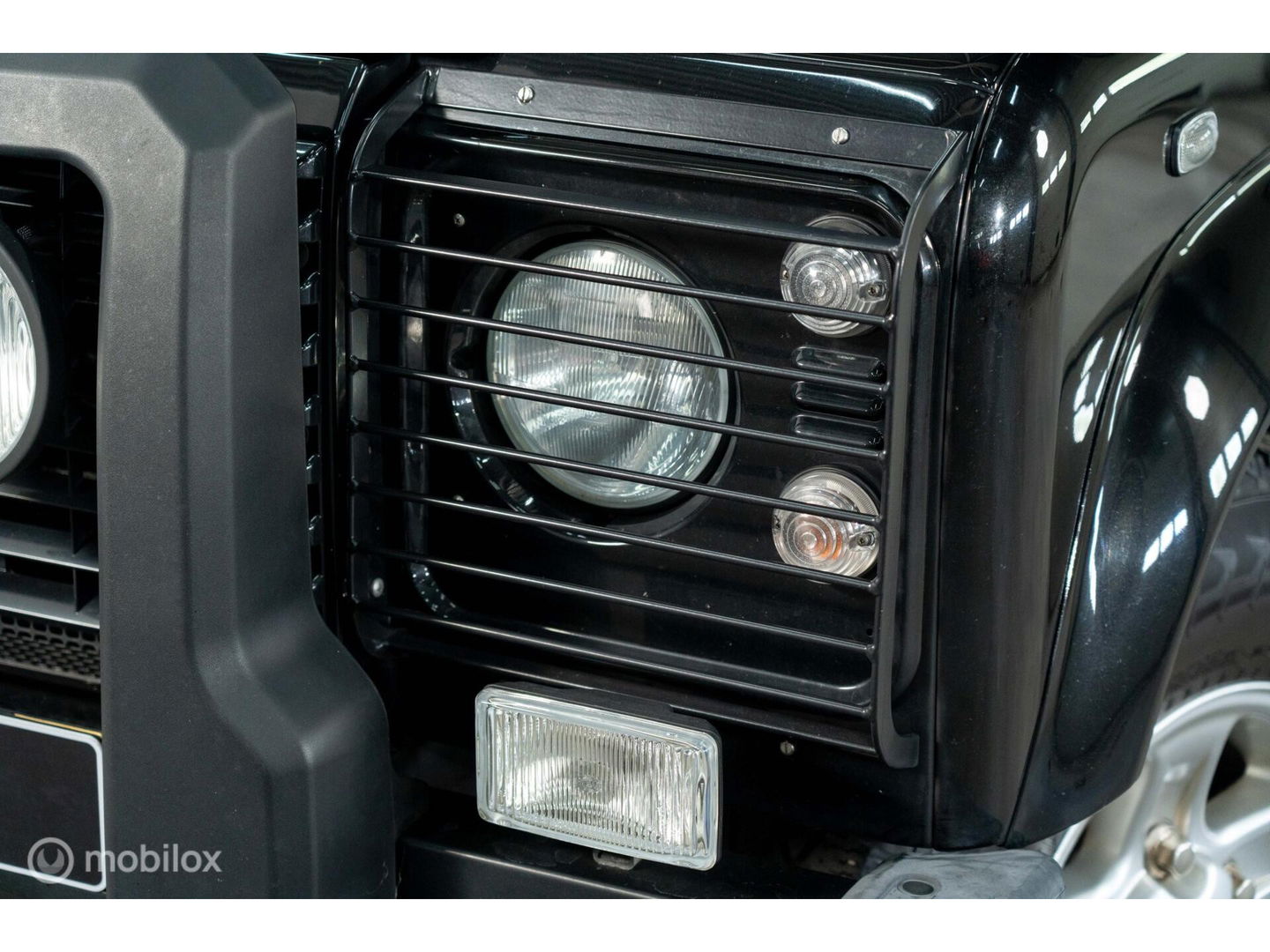 Land Rover Defender 90 SW geel kenteken