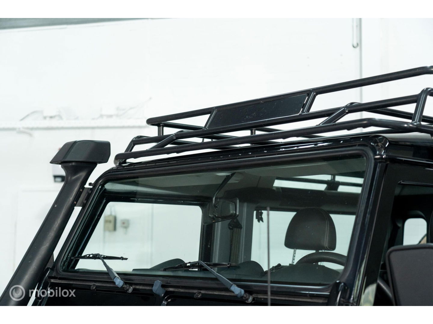 Land Rover Defender 90 SW geel kenteken