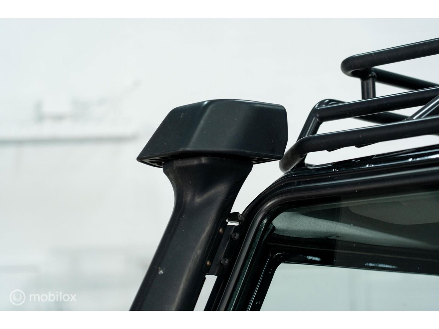 Land Rover Defender 90 SW geel kenteken