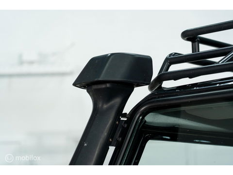 Land Rover Defender 90 SW geel kenteken