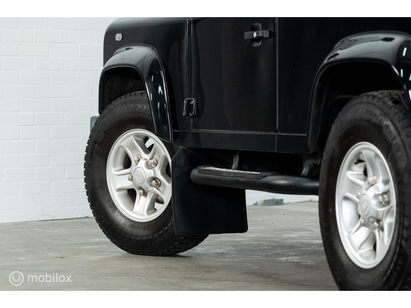 Land Rover Defender 90 SW geel kenteken