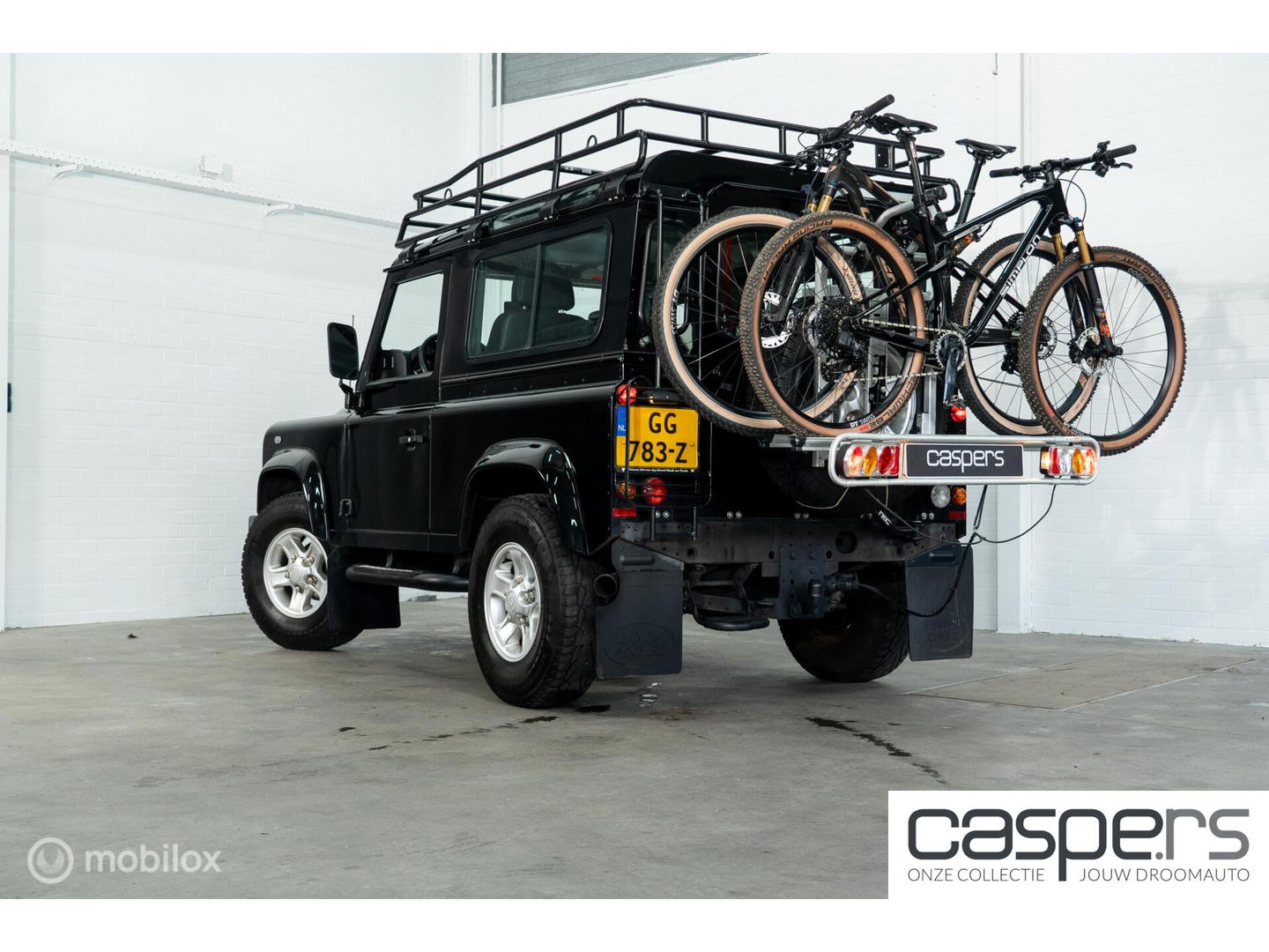 Land Rover Defender 90 SW geel kenteken