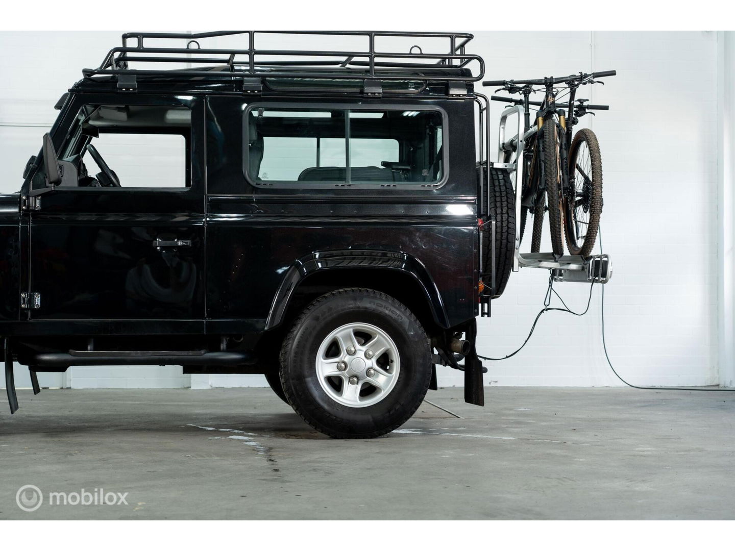 Land Rover Defender 90 SW geel kenteken
