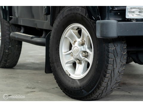 Land Rover Defender 90 SW geel kenteken