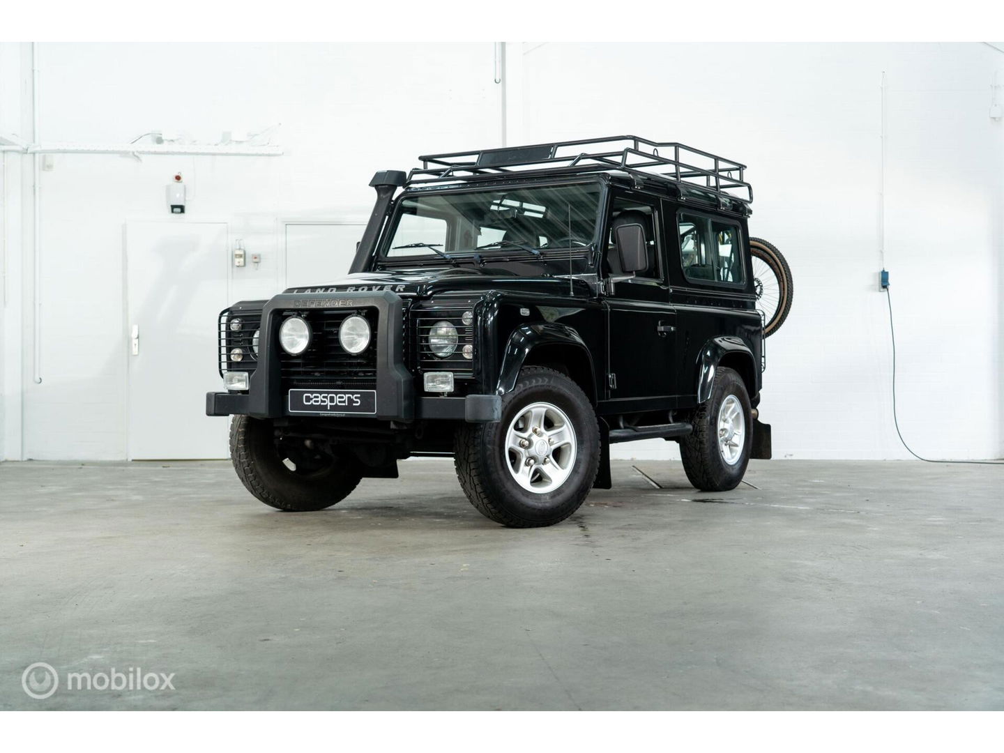 Land Rover Defender 90 SW geel kenteken