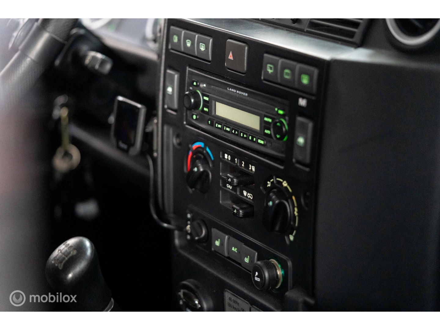 Land Rover Defender 90 SW geel kenteken