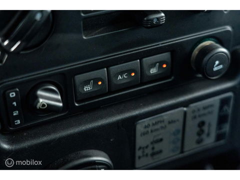 Land Rover Defender 90 SW geel kenteken