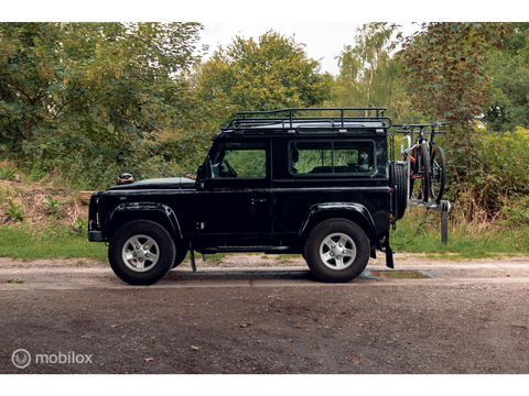 Land Rover Defender 90 SW geel kenteken