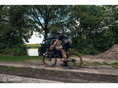 Land Rover Defender 90 SW geel kenteken