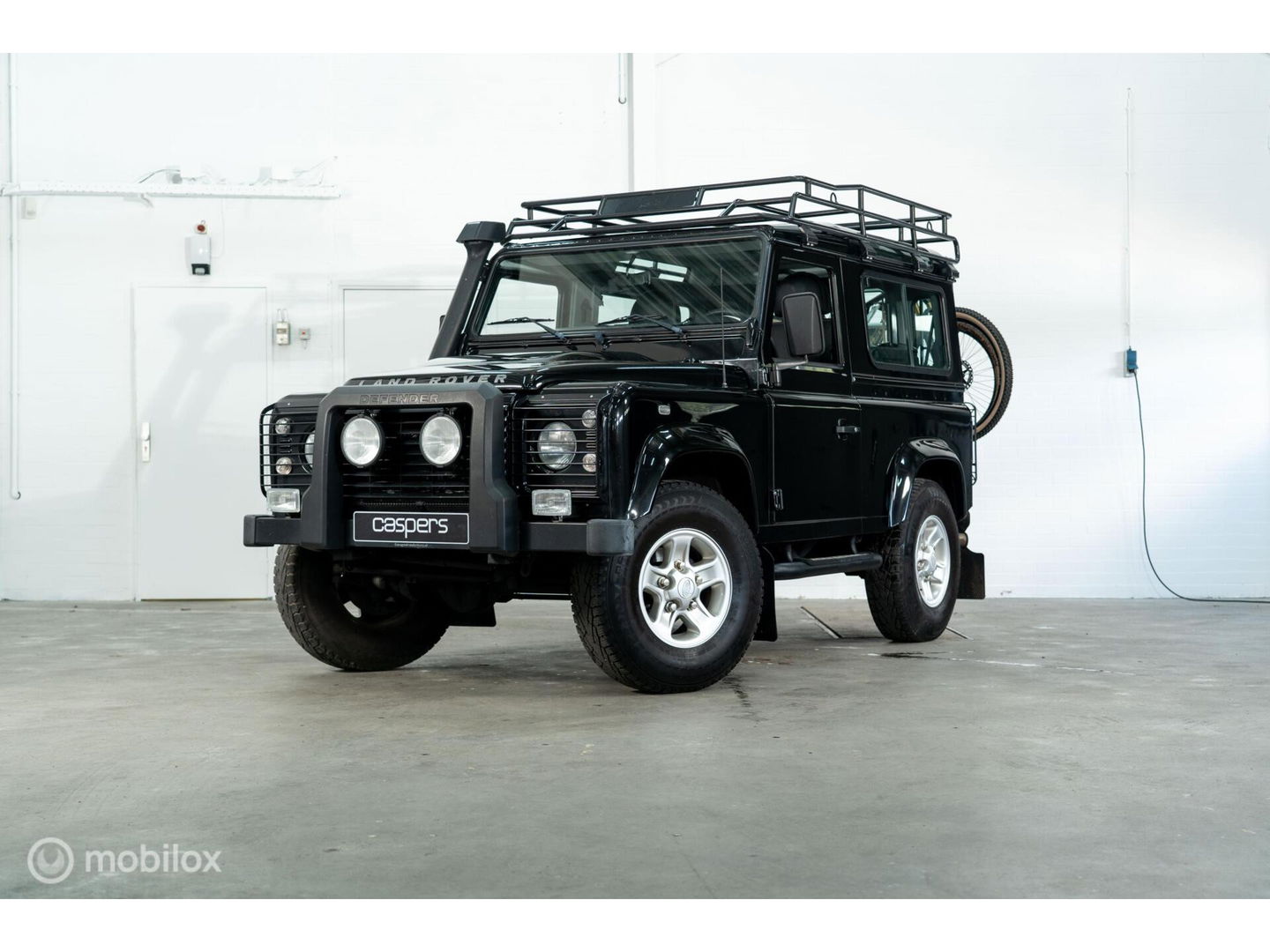 Land Rover Defender 90 SW geel kenteken
