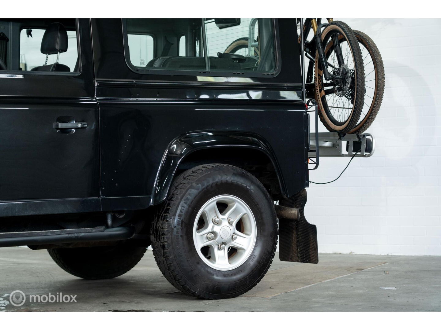 Land Rover Defender 90 SW geel kenteken
