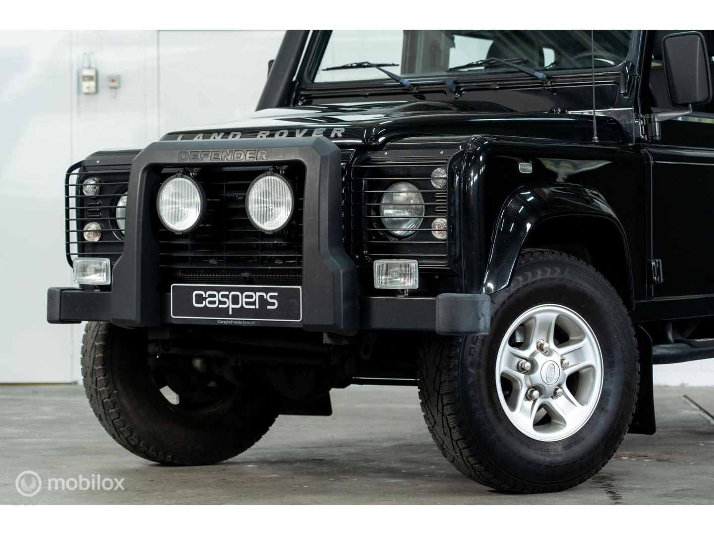 Land Rover Defender 90 SW geel kenteken