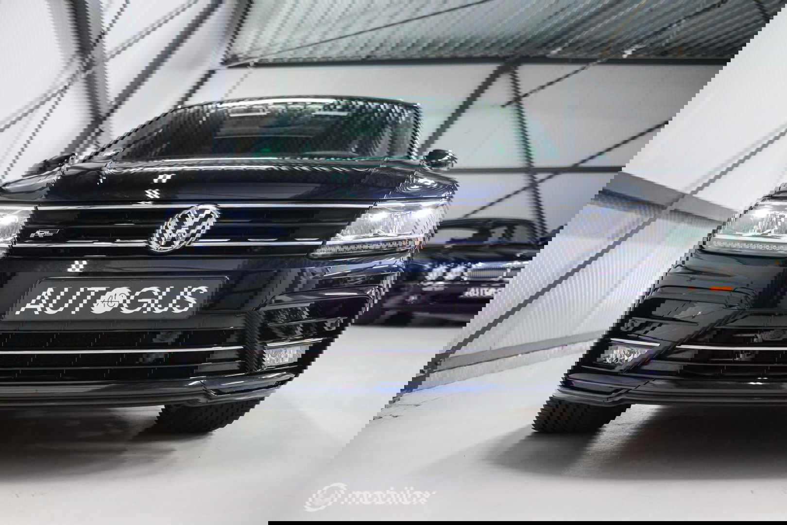 Volkswagen Tiguan 2.0 TSI 4Motion Highline Business R 230 pk | HUD | Panorama | Virtual cockpit | Trekhaak | Camera | Sportstoelen | Stoelverwarmi