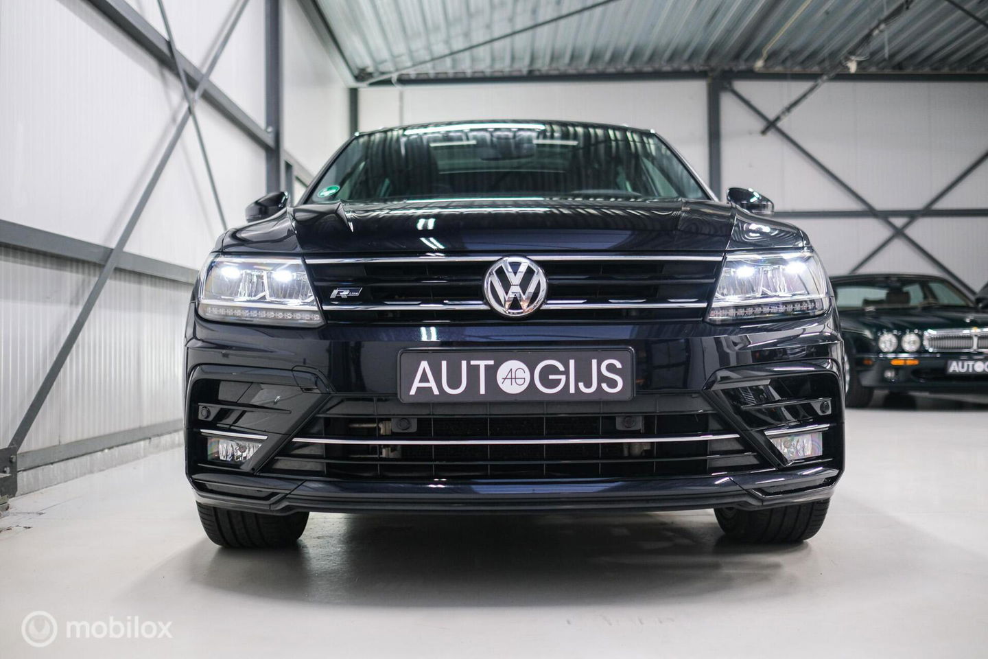 Volkswagen Tiguan 2.0 TSI 4Motion Highline Business R 230 pk | HUD | Panorama | Virtual cockpit | Trekhaak | Camera | Sportstoelen | Stoelverwarmi