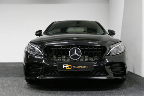 Mercedes-Benz C-Klasse 180 AMG Line / Orig. Nederlands / C63s AMG Diffuser / Panamericana Grille / Carbon interieurdelen / Burmester Surround Sound / Elektr. verstelbare voorstoelen + memory / Ambienteverlichting / Stoelverwarming / Apple Carplay - Android Auto / 20'' LMV / Ach