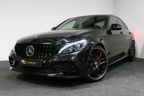 Mercedes-Benz C-Klasse 180 AMG Line / Orig. Nederlands / C63s AMG Diffuser / Panamericana Grille / Carbon interieurdelen / Burmester Surround Sound / Elektr. verstelbare voorstoelen + memory / Ambienteverlichting / Stoelverwarming / Apple Carplay - Android Auto / 20'' LMV / Ach