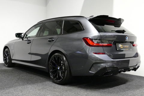 BMW 3 Serie Touring 330e xDrive M Sport / M340i Diffuser / Black Diamond M Grill / M340i M Sport bumper pakket / Schuif-/kanteldak / Elektr. verstelbare voorstoelen (links met memory) / Stoelverwarming / Apple Carplay - Android Auto / Achteruitrijcamera / Trekhaak (z