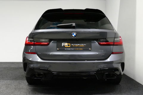 BMW 3 Serie Touring 330e xDrive M Sport / M340i Diffuser / Black Diamond M Grill / M340i M Sport bumper pakket / Schuif-/kanteldak / Elektr. verstelbare voorstoelen (links met memory) / Stoelverwarming / Apple Carplay - Android Auto / Achteruitrijcamera / Trekhaak (z