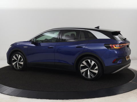 Volkswagen ID.4 First 77 kWh | Stoel & stuurverwarming | Camera | Carplay | Adaptive cruise | Half leder | 20'' | Navigatie | DAB | Sfeerverlichting
