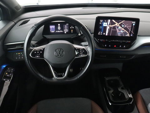 Volkswagen ID.4 First 77 kWh | Stoel & stuurverwarming | Camera | Carplay | Adaptive cruise | Half leder | 20'' | Navigatie | DAB | Sfeerverlichting