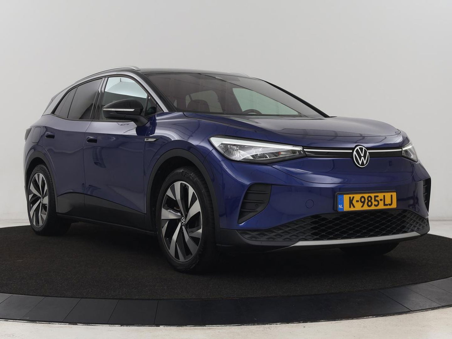 Volkswagen ID.4 First 77 kWh | Stoel & stuurverwarming | Camera | Carplay | Adaptive cruise | Half leder | 20'' | Navigatie | DAB | Sfeerverlichting