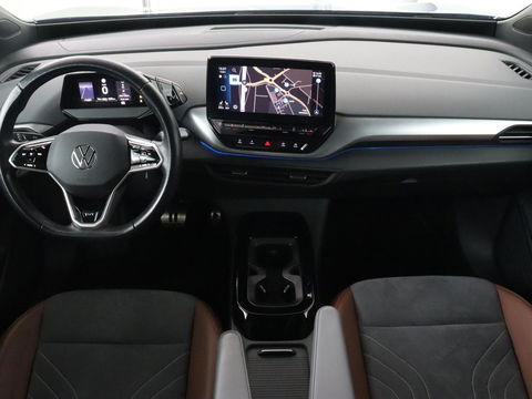 Volkswagen ID.4 First 77 kWh | Stoel & stuurverwarming | Camera | Carplay | Adaptive cruise | Half leder | 20'' | Navigatie | DAB | Sfeerverlichting