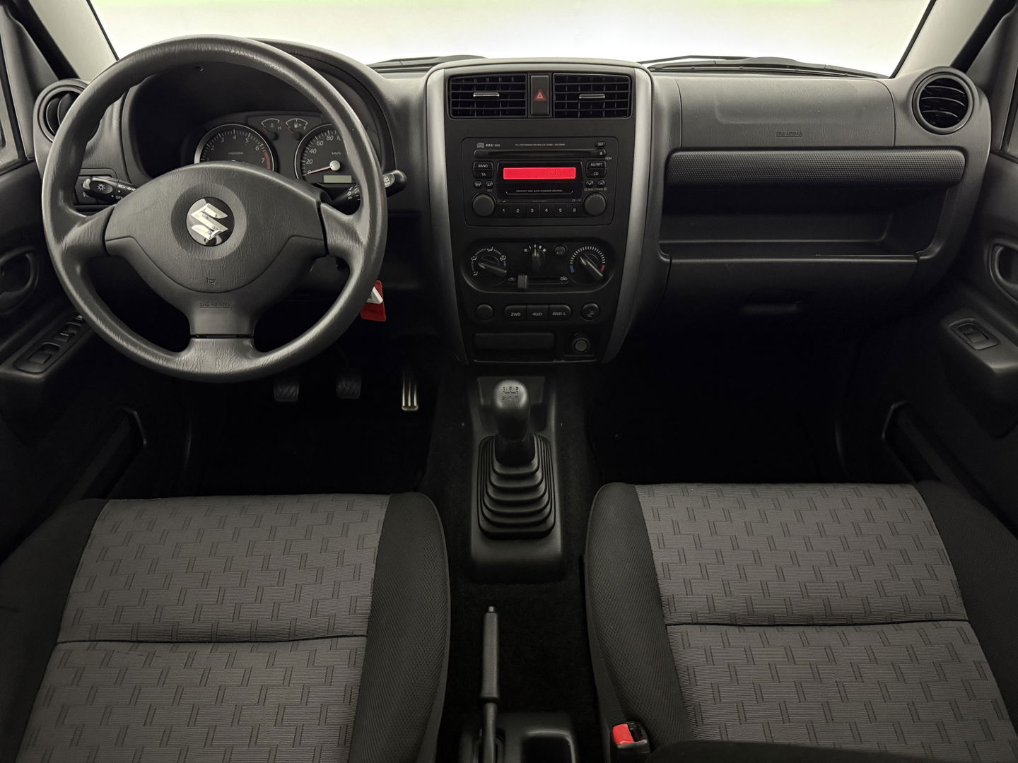 Suzuki Jimny 1.3 Exclusive | 4x4 | Airco | Bullbar | Sidebars | 15"LMV | Elektrpakket