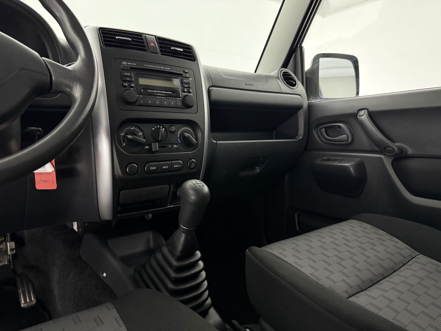 Suzuki Jimny 1.3 Exclusive | 4x4 | Airco | Bullbar | Sidebars | 15"LMV | Elektrpakket