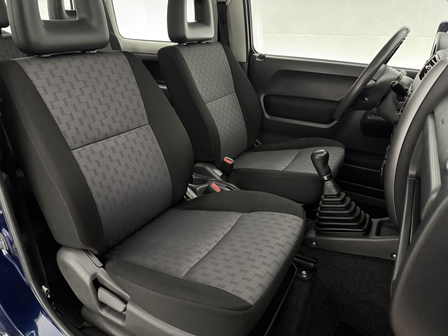 Suzuki Jimny 1.3 Exclusive | 4x4 | Airco | Bullbar | Sidebars | 15"LMV | Elektrpakket