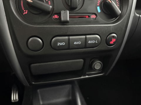 Suzuki Jimny 1.3 Exclusive | 4x4 | Airco | Bullbar | Sidebars | 15"LMV | Elektrpakket