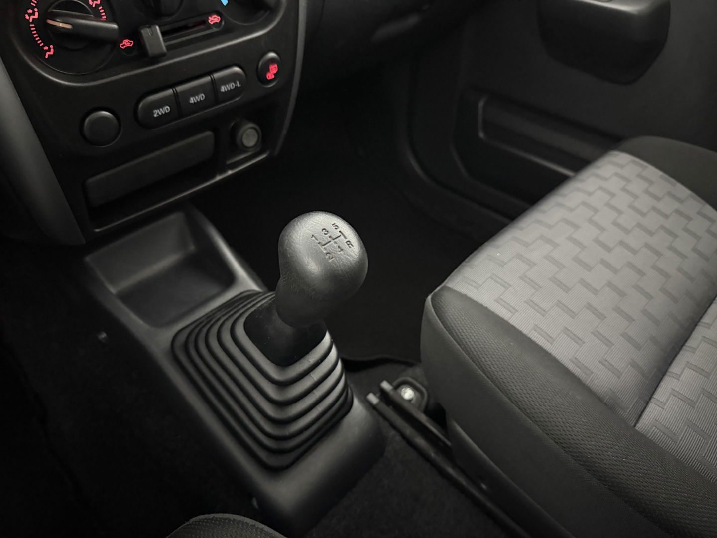 Suzuki Jimny 1.3 Exclusive | 4x4 | Airco | Bullbar | Sidebars | 15"LMV | Elektrpakket