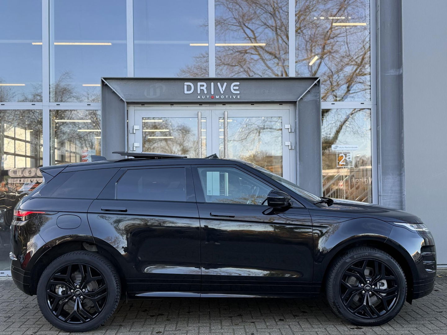 Land Rover Range Rover Evoque 1.5 P300e AWD R-Dynamic SE Black Style|Schuif/Kantel dak|Sfeer|Meridian|Memory|ACC|Winterpakket|Trekhaak