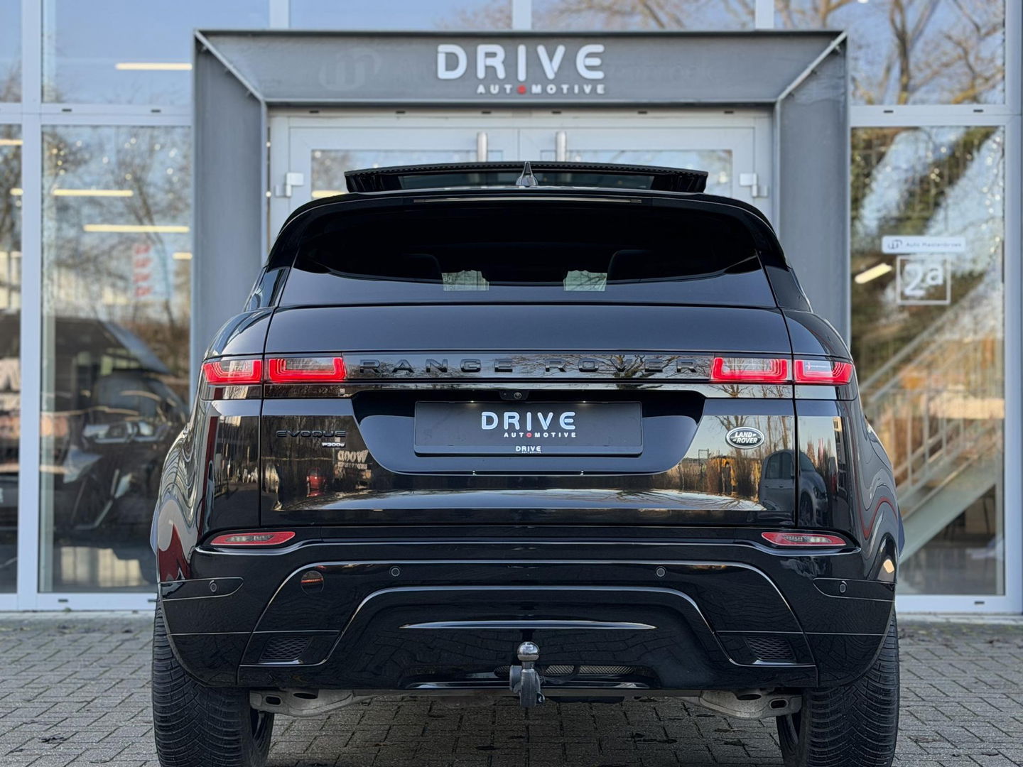 Land Rover Range Rover Evoque 1.5 P300e AWD R-Dynamic SE Black Style|Schuif/Kantel dak|Sfeer|Meridian|Memory|ACC|Winterpakket|Trekhaak