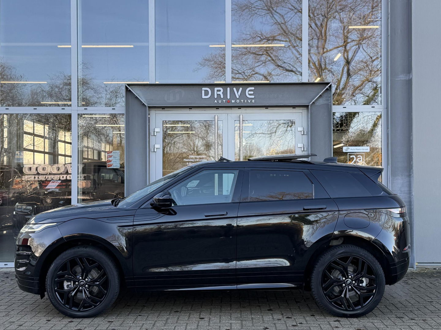 Land Rover Range Rover Evoque 1.5 P300e AWD R-Dynamic SE Black Style|Schuif/Kantel dak|Sfeer|Meridian|Memory|ACC|Winterpakket|Trekhaak