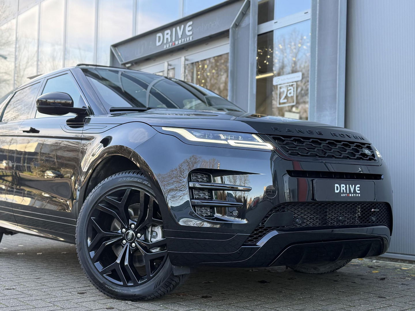 Land Rover Range Rover Evoque 1.5 P300e AWD R-Dynamic SE Black Style|Schuif/Kantel dak|Sfeer|Meridian|Memory|ACC|Winterpakket|Trekhaak