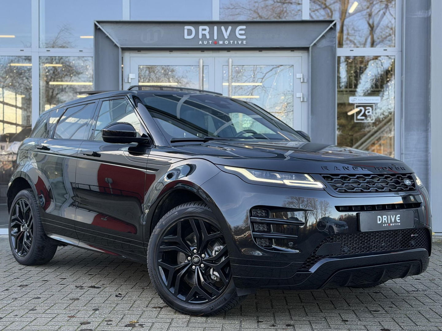 Land Rover Range Rover Evoque 1.5 P300e AWD R-Dynamic SE Black Style|Schuif/Kantel dak|Sfeer|Meridian|Memory|ACC|Winterpakket|Trekhaak