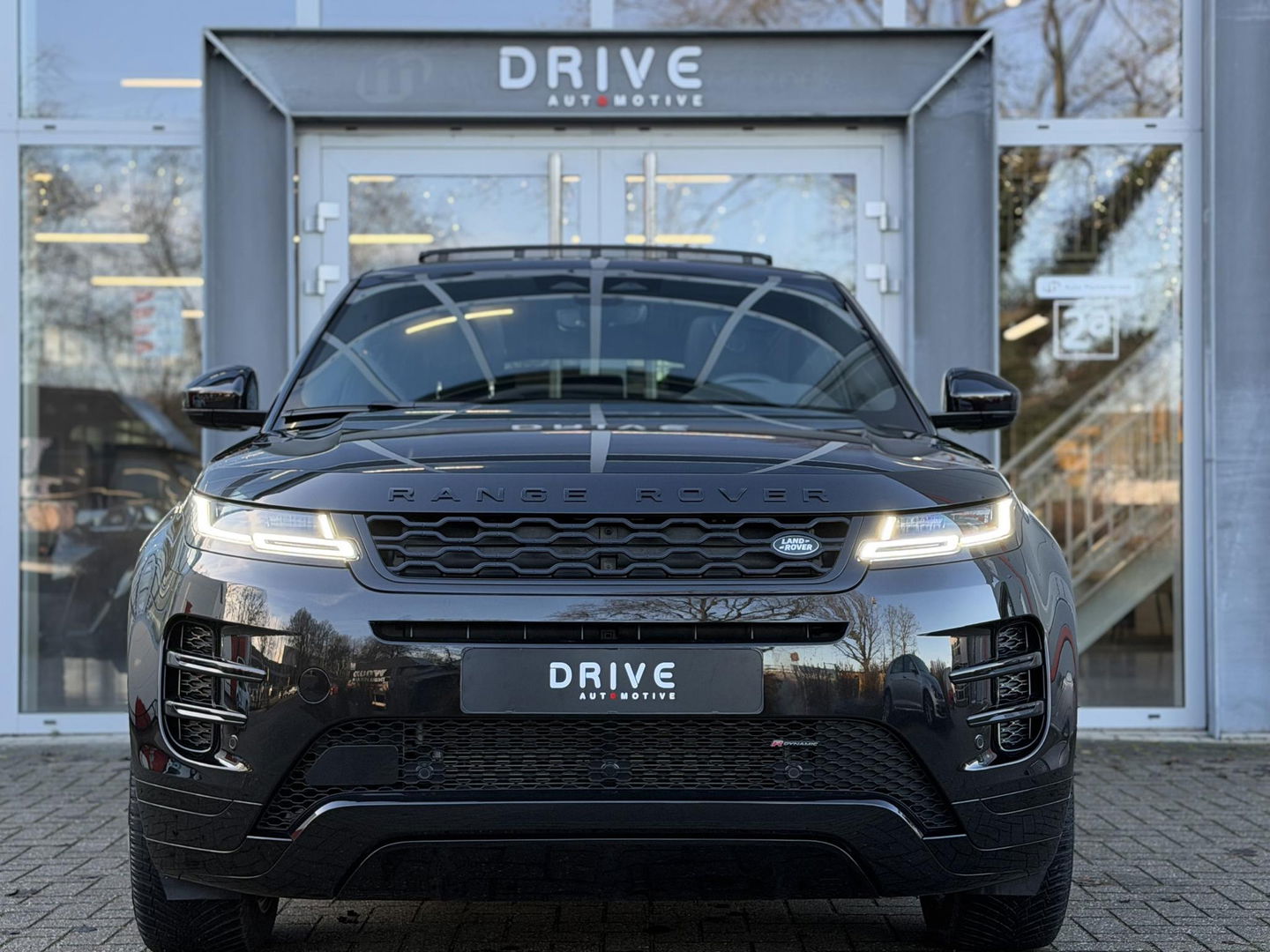 Land Rover Range Rover Evoque 1.5 P300e AWD R-Dynamic SE Black Style|Schuif/Kantel dak|Sfeer|Meridian|Memory|ACC|Winterpakket|Trekhaak