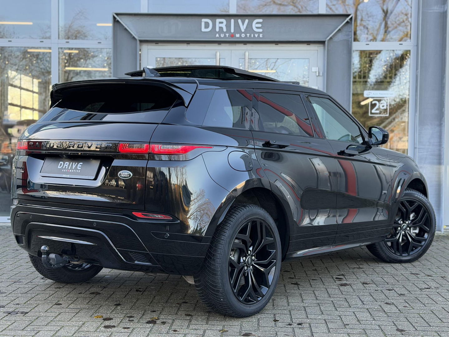 Land Rover Range Rover Evoque 1.5 P300e AWD R-Dynamic SE Black Style|Schuif/Kantel dak|Sfeer|Meridian|Memory|ACC|Winterpakket|Trekhaak