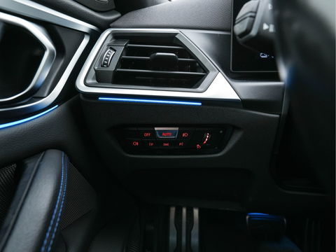 BMW i4 M50 M-Sportpack High Executive 84 kWh [ 3-Fase ] {SOH-97%} (INCL-BTW) *HEAD-UP | LASER-LED | LUXURY-LEATHER | HARMAN/KARDON | ADAPTIVE-CRUISE | BLIND-SPOT | TOP-VIEW | HEATED-SPORTSEATS | DAB+ | WIDE-COCKPIT | AMBIENT-LIGHT | NAVI-FULLMAP | 19